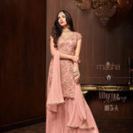 streamlined-peach-color-heavy-embroidered-net-full-moti-work-suit