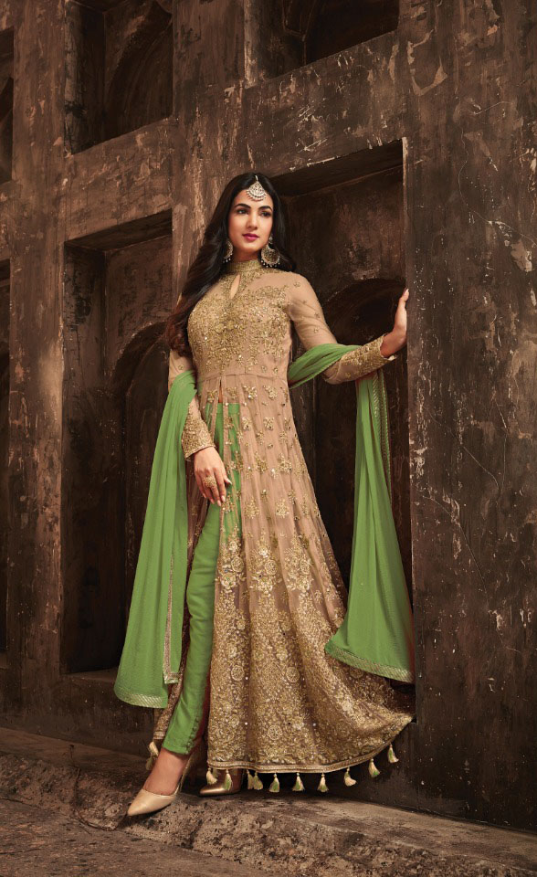 thrilling-green-color-heavy-net-with-embroiderystone-work-suit