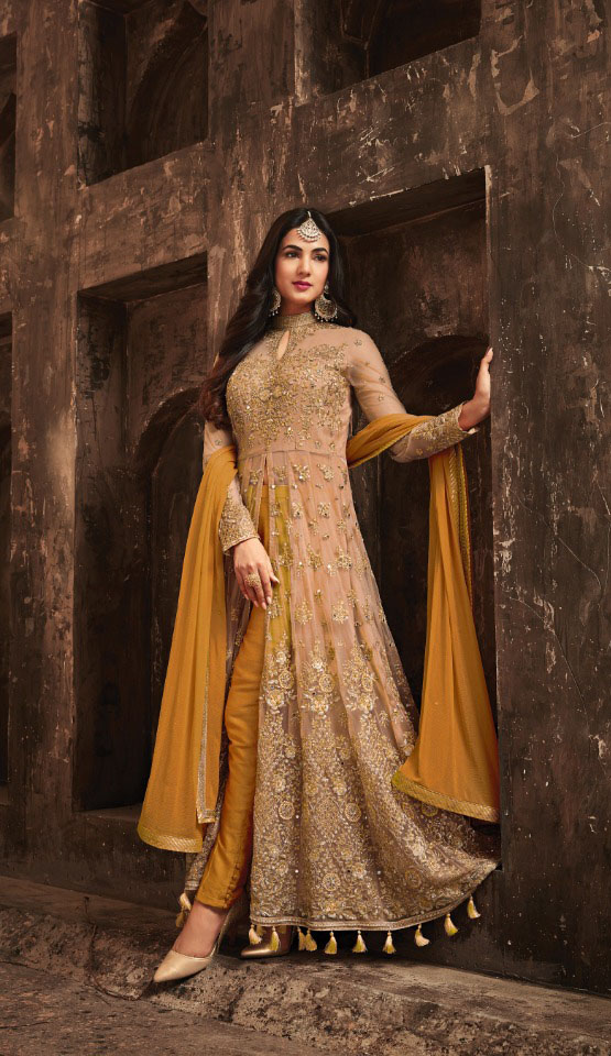 thrilling-yellow-color-heavy-net-with-embroiderystone-work-suit