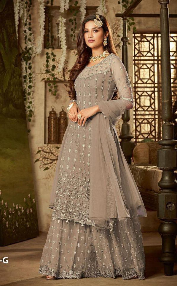mesmerizing-peanut-color-heavy-net-embroidered-stone-work-sharara-suit