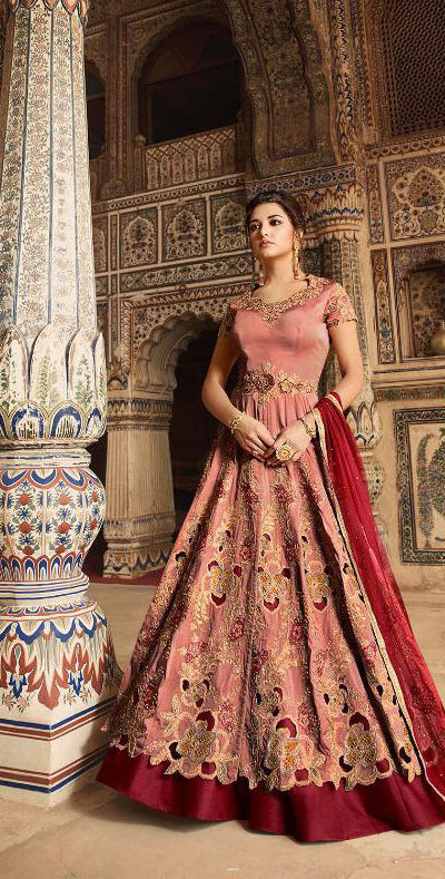 picturesque-orenge-color-heavy-net-embroidered-codding-stone-work-sharara-suit