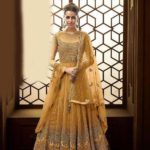 vibrant-yellow-color-heavy-net-with-embroidery-work-stone-work-anarkali-suit