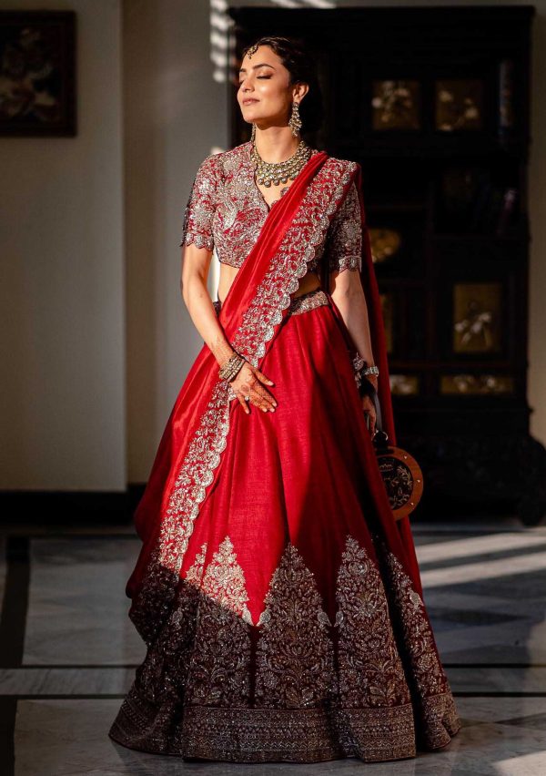 glorious-nisha-agarwal-in-red-color-bridal-lehenga-at-kajal-wedding-event