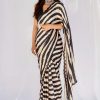 beauteous-kajol-in-black-white-striped-saree-with-heavy-sequence-blouse
