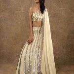 magnificent-cream-color-manish-malhotra-sequence-party-wear-lehenga
