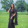 glamorous-black-color-georgette-with-sequence-embellished-ruffle-saree
