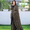party-wear-black-color-sequins-strips-work-saree-with-georgette