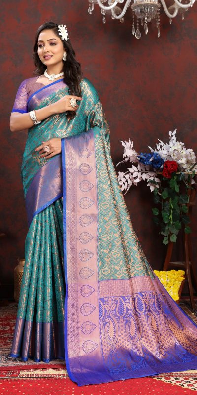 Dazzling Rama Green Color Lichi Silk Gold And Cooper Zari Weaving Saree