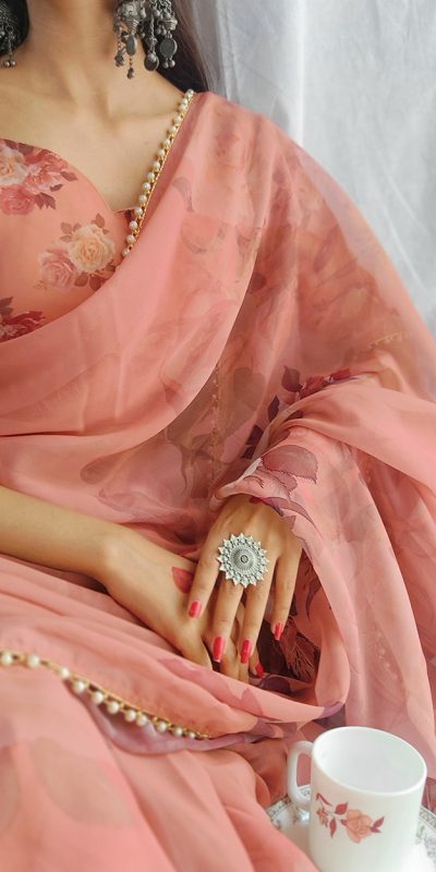 Graceful Orange Color Georgette Printed pearl lace border Saree