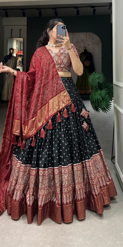 Stylish Black Color Tussar Patola Print Foil Work Lehenga Choli