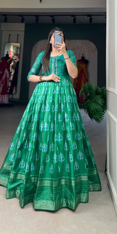 Sublime Green Color Dola Silk Printed with Zari Border Gown