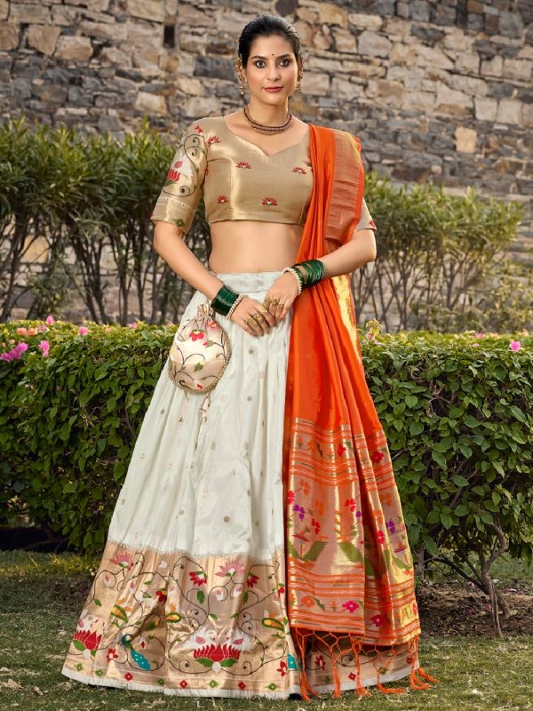 Artful White Color Jacquard Silk Weaving Zari Lehenga Choli