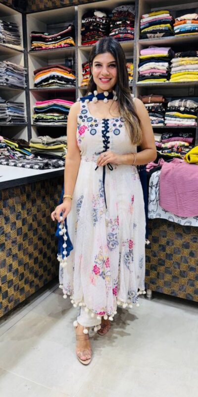 ZSR 3147 White Georgette Butti With Digital Print And Mirror Work Perfect for Wedding, Party, Engagement, Holi, Cultural Events 2099/- only | Gowns, Bollywood Gowns, Creative Gowns, Designer Gowns, Embroidered Gowns, Party Wear Gowns