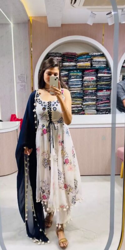 ZSR 3147 White Georgette Butti With Digital Print And Mirror Work Perfect for Wedding, Party, Engagement, Holi, Cultural Events 2099/- only | Gowns, Bollywood Gowns, Creative Gowns, Designer Gowns, Embroidered Gowns, Party Wear Gowns