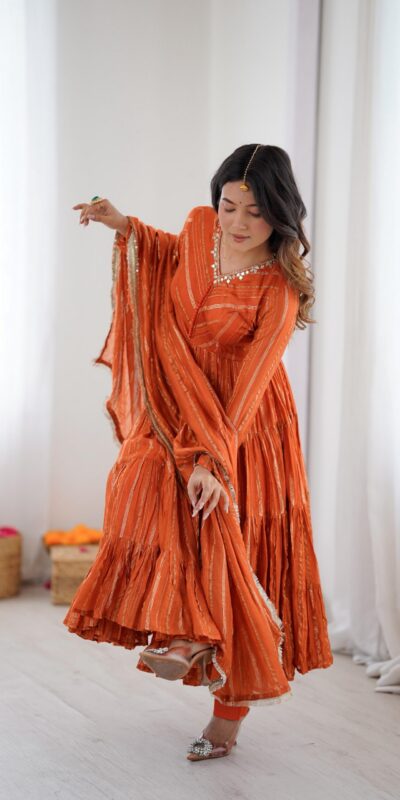 SRK 5305 Orange Color Mal Chanderi Gown with Mirror Work & Lace Work. Grab it for ₹2399. Delivery 4-6 Working Days. Shop now. | Jump Suits, Salwar suit, Casual Suits, Creative suits, Designer Suits, Palazzo Suits, Party Wear Suits, Patiala Suits, Straight Suits