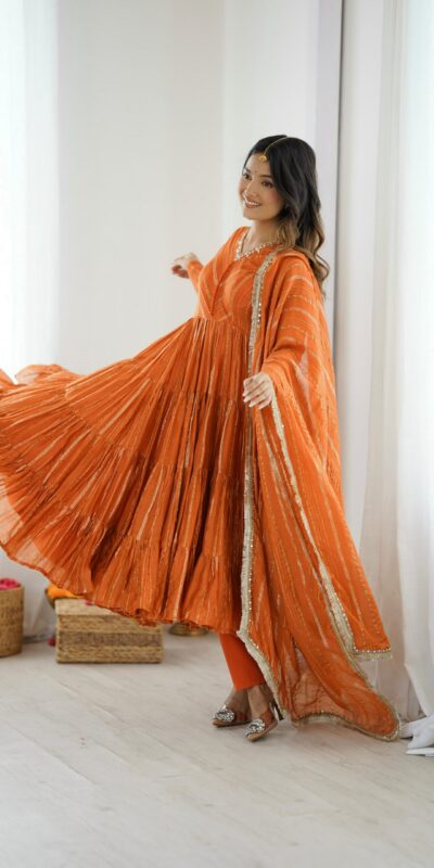 SRK 5305 Orange Color Mal Chanderi Gown with Mirror Work & Lace Work. Grab it for ₹2399. Delivery 4-6 Working Days. Shop now. | Jump Suits, Salwar suit, Casual Suits, Creative suits, Designer Suits, Palazzo Suits, Party Wear Suits, Patiala Suits, Straight Suits