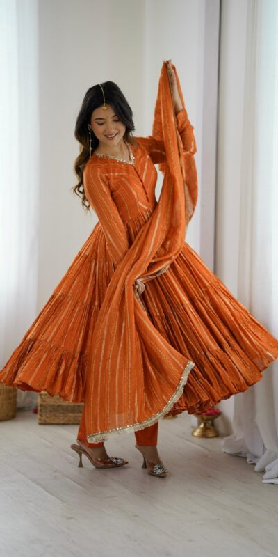 SRK 5305 Orange Color Mal Chanderi Gown with Mirror Work & Lace Work. Grab it for ₹2399. Delivery 4-6 Working Days. Shop now. | Jump Suits, Salwar suit, Casual Suits, Creative suits, Designer Suits, Palazzo Suits, Party Wear Suits, Patiala Suits, Straight Suits