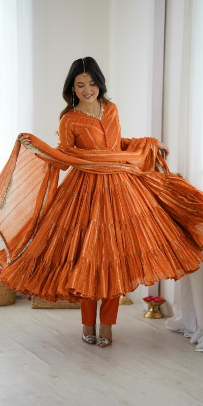 SRK 5305 Orange Color Mal Chanderi Gown with Mirror Work & Lace Work. Grab it for ₹2399. Delivery 4-6 Working Days. Shop now. | Jump Suits, Salwar suit, Casual Suits, Creative suits, Designer Suits, Palazzo Suits, Party Wear Suits, Patiala Suits, Straight Suits