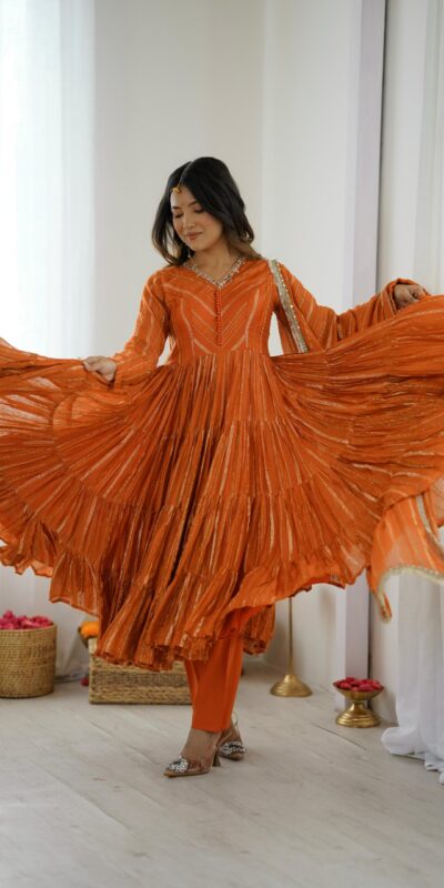 SRK 5305 Orange Color Mal Chanderi Gown with Mirror Work & Lace Work. Grab it for ₹2399. Delivery 4-6 Working Days. Shop now. | Gowns, Bollywood Gowns, Creative Gowns, Designer Gowns, Embroidered Gowns, Party Wear Gowns