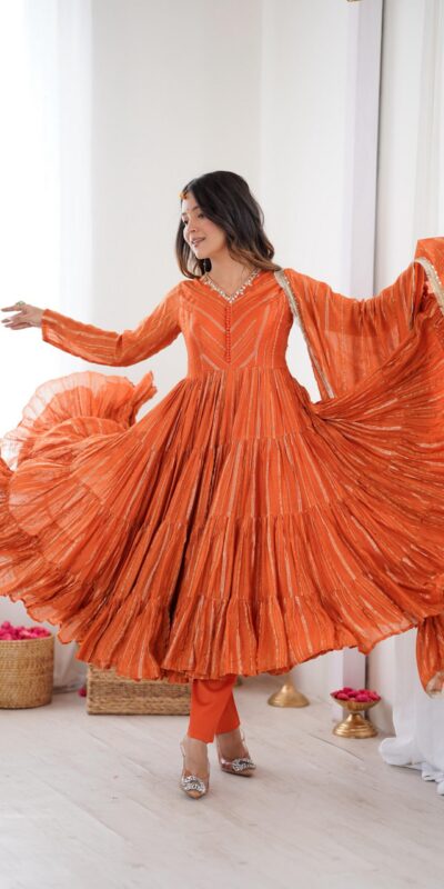 SRK 5305 Orange Color Mal Chanderi Gown with Mirror Work & Lace Work. Grab it for ₹2399. Delivery 4-6 Working Days. Shop now. | Gowns, Bollywood Gowns, Creative Gowns, Designer Gowns, Embroidered Gowns, Party Wear Gowns