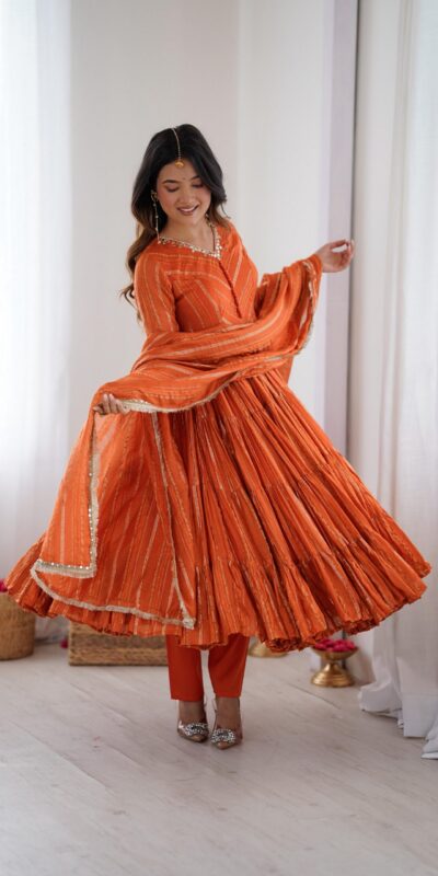 SRK 5305 Orange Color Mal Chanderi Gown with Mirror Work & Lace Work. Grab it for ₹2399. Delivery 4-6 Working Days. Shop now. | Gowns, Bollywood Gowns, Creative Gowns, Designer Gowns, Embroidered Gowns, Party Wear Gowns