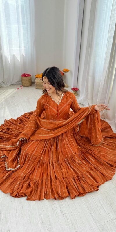 SRK 5305 Orange Color Mal Chanderi Gown with Mirror Work & Lace Work. Grab it for ₹2399. Delivery 4-6 Working Days. Shop now. | Gowns, Bollywood Gowns, Creative Gowns, Designer Gowns, Embroidered Gowns, Party Wear Gowns