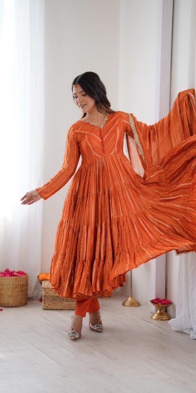 SRK 5305 Orange Color Mal Chanderi Gown with Mirror Work & Lace Work. Grab it for ₹2399. Delivery 4-6 Working Days. Shop now. | Jump Suits, Salwar suit, Casual Suits, Creative suits, Designer Suits, Palazzo Suits, Party Wear Suits, Patiala Suits, Straight Suits