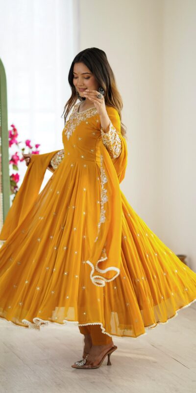 ZF 5012 Yellow Blooming Faux Gown with Embroidery Work. Wedding, Party, Festive, Events Grab it for ₹2149. Delivery 4-6 Working Days. Shop now. | Lehenga, Bollywood Lehenga, Creative Lehenga, Designer Lehenga, Embroidered Lehenga, Party Wear Lehenga