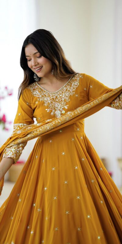 ZF 5012 Yellow Blooming Faux Gown with Embroidery Work. Wedding, Party, Festive, Events Grab it for ₹2149. Delivery 4-6 Working Days. Shop now. | Gowns, Bollywood Gowns, Creative Gowns, Designer Gowns, Embroidered Gowns, Party Wear Gowns