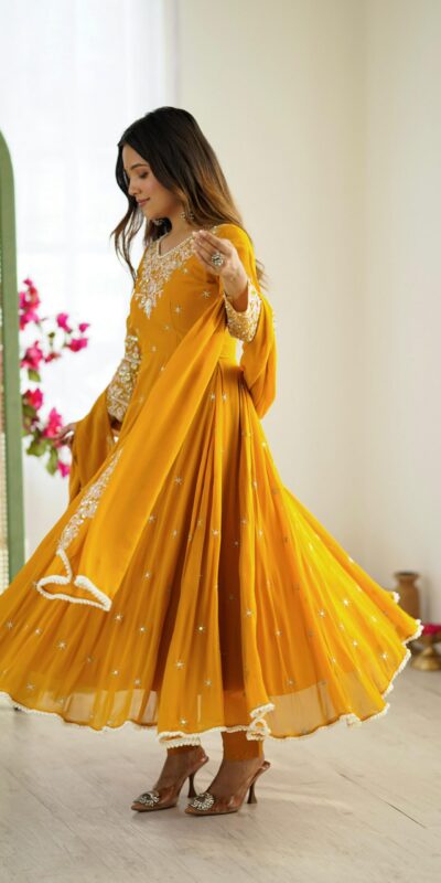 ZF 5012 Yellow Blooming Faux Gown with Embroidery Work. Wedding, Party, Festive, Events Grab it for ₹2149. Delivery 4-6 Working Days. Shop now. | Lehenga, Bollywood Lehenga, Creative Lehenga, Designer Lehenga, Embroidered Lehenga, Party Wear Lehenga
