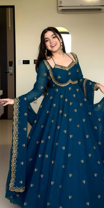 MF 1003 Peacock Blue Georgette Gown. Perfect for Wedding, Party, Pongal, Bridal Wear, Anniversary Price ₹1799. Delivery 4-6 Working Days. Shop now. | Gowns, Bollywood Gowns, Creative Gowns, Designer Gowns, Embroidered Gowns, Party Wear Gowns