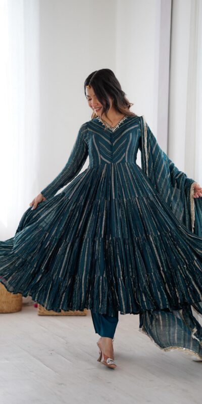 SRK 5305 Peacock Blue Color Mal Chanderi Gown with Mirror Work & Lace Work. Grab it for ₹2399. Delivery 4-6 Working Days. Shop now. | Gowns, Bollywood Gowns, Creative Gowns, Designer Gowns, Embroidered Gowns, Party Wear Gowns