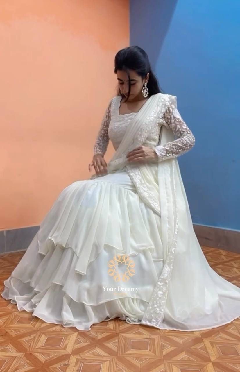 KF 1663 White Faux Georgette Lehenga Choli with Embroidery Work & Sequins Work. Grab it for ₹2099. Delivery 4-6 Working Days. Shop now. | Lehenga, Bollywood Lehenga, Creative Lehenga, Designer Lehenga, Embroidered Lehenga, Party Wear Lehenga