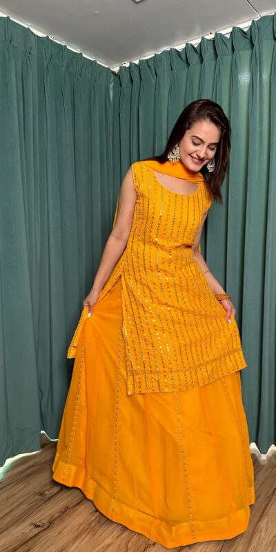 ₹2549 | FB L299 Yellow in Color Georgette Mirror Work Lehenga Choli e. Introductory Price ₹2549. Delivery 4-6 Working Days. Shop now. | Lehenga, Bollywood Lehenga, Creative Lehenga, Designer Lehenga, Embroidered Lehenga, Party Wear Lehenga