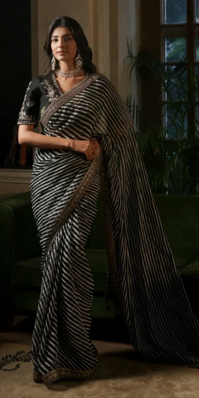 NC 5553 Black Faux Georgette Saree Perfect for Wedding, Party, Bridal Wear, Baisakhi, Raksha Bandhan –. Introductory Price ₹1899. Delivery 4-6 Workin | Sarees, Bollywood Sarees, Creative Sarees, Designer Sarees, Embroidered Sarees, Ethnic Saree, Modern Digital sarees, Party Wear Sarees