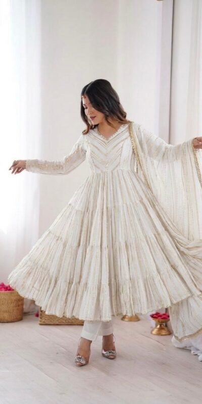 SRK 5305 White Color Mal Chanderi Gown with Mirror Work & Lace Work. Grab it for ₹2399. Delivery 4-6 Working Days. Shop now. | Gowns, Bollywood Gowns, Creative Gowns, Designer Gowns, Embroidered Gowns, Party Wear Gowns
