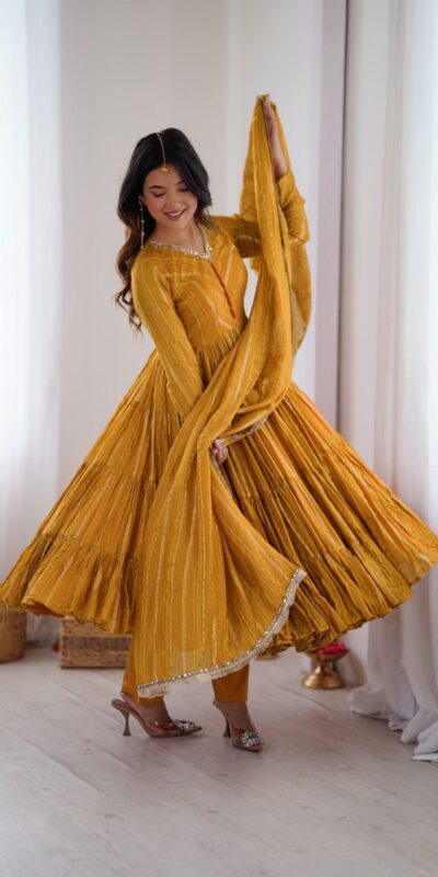 SRK 5305 Yellow Color Mal Chanderi Gown with Mirror Work & Lace Work. Grab it for ₹2399. Delivery 4-6 Working Days. Shop now. | Gowns, Bollywood Gowns, Creative Gowns, Designer Gowns, Embroidered Gowns, Party Wear Gowns