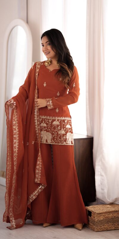 Shiny Rust Crunchy Silk Embroider Salwar Suit .