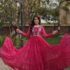 Shiny Pink Faux Georgette Laheriya Print Work Gown