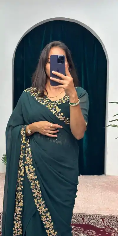 Exotic Peacock Blue Color Faux Georgette Embroidery Work Border Stitched Saree-Gown