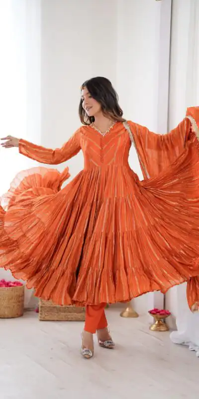 SRK 5305 Orange Color Mal Chanderi Gown with Mirror Work & Lace Work. Grab it for ₹2399. Delivery 4-6 Working Days. Shop now. | Gowns, Bollywood Gowns, Creative Gowns, Designer Gowns, Embroidered Gowns, Party Wear Gowns