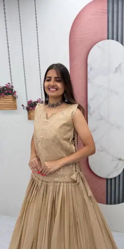 Pretty Cream Crunchy Silk With Sequins Work Lehenga Choli