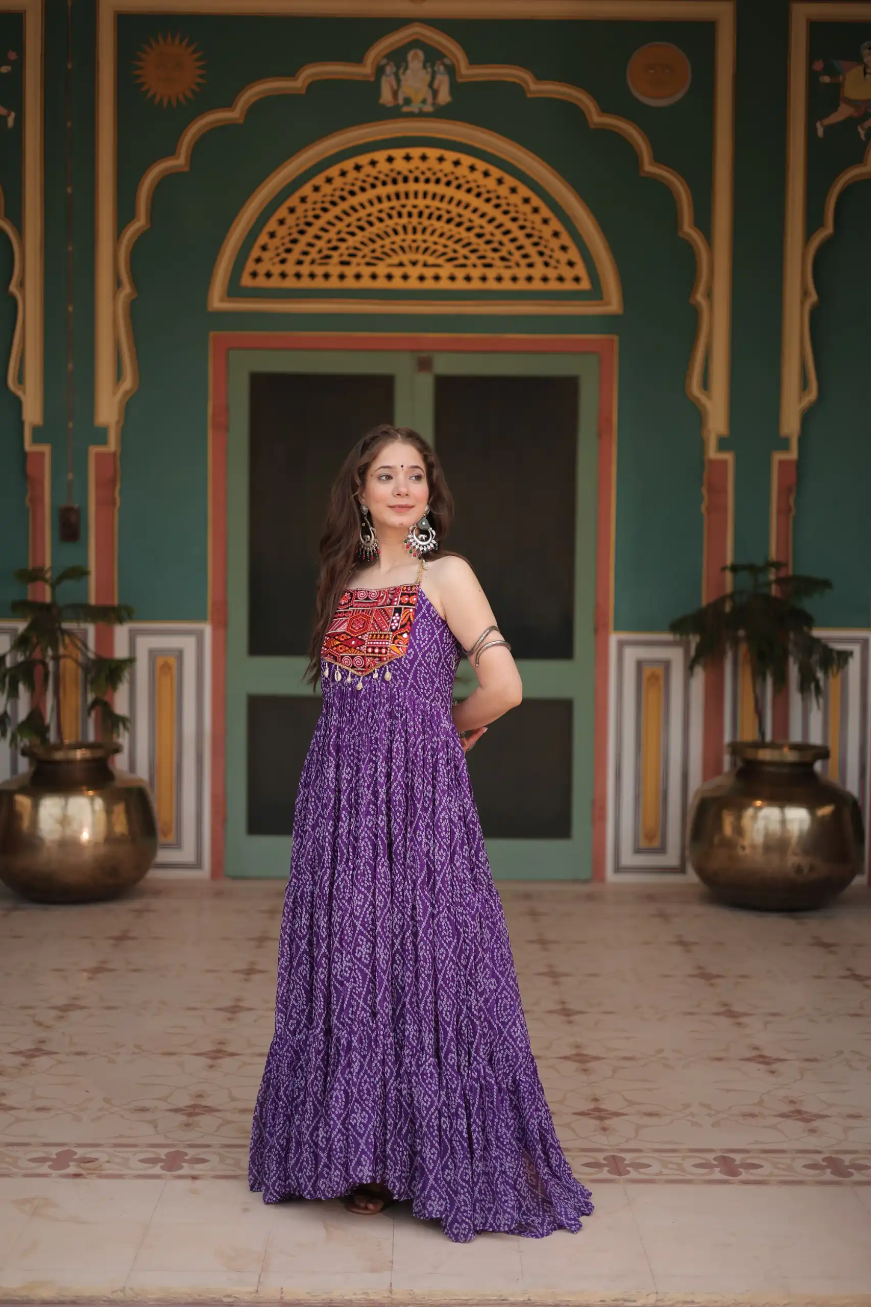 Aglow Purple Fox Georgette Bandhani Print Work Gown
