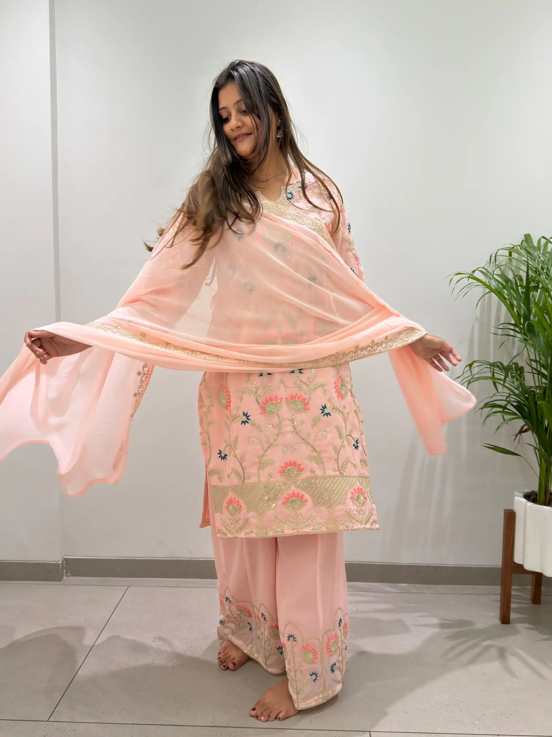 Pretty Peach Faux Georgette Sequence Work Salwar Suit