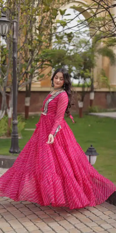 Shiny Pink Faux Georgette Laheriya Print Work Gown