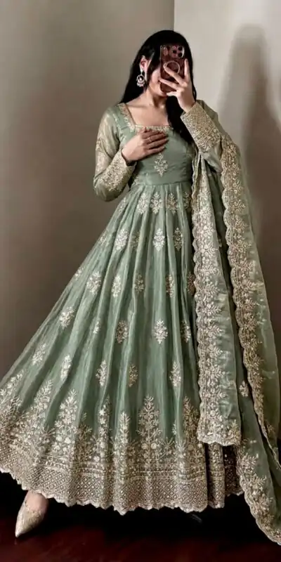Trendy Pista Fendy Silk Embroidery Work Gown