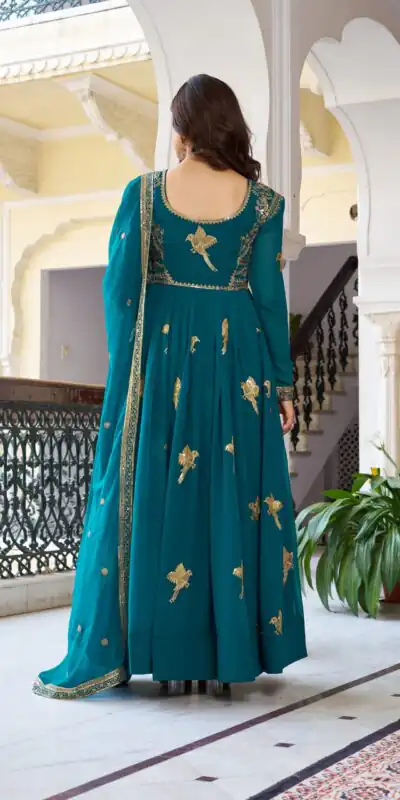 SP 30 Teal Faux Georgette Gown with Mirror Work & Embroidery Work. Get it for ₹1799. Delivery 4-6 Working Days. Online Shop now. | Gowns, Bollywood Gowns, Creative Gowns, Designer Gowns, Embroidered Gowns, Party Wear Gowns