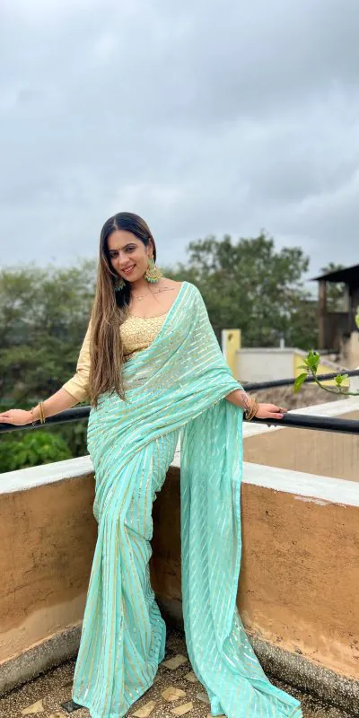 Glamorous Sky Blue Color Georgette Sequence Work Saree