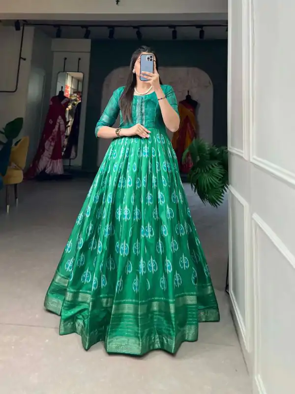 Sublime Green Color Dola Silk Printed with Zari Border Gown