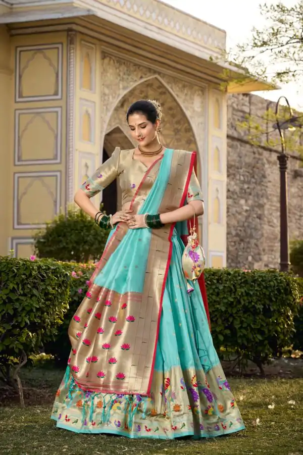 Artful Sky Blue Color Jacquard Silk Weaving Zari Lehenga Choli